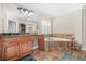 Bathroom with granite countertops, a soaking tub with decorative tile surround, and tile floors at 1331 Ashbury Park Dr, Hoschton, GA 30548