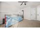Bedroom featuring neutral carpet and ensuite bathroom at 1331 Ashbury Park Dr, Hoschton, GA 30548