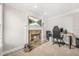 Home office with fireplace and desk at 1331 Ashbury Park Dr, Hoschton, GA 30548