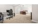Spacious main bedroom with carpet and a bed at 1331 Ashbury Park Dr, Hoschton, GA 30548