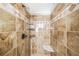 Shower featuring decorative tiles, a shower head, and tiled walls at 1331 Ashbury Park Dr, Hoschton, GA 30548