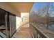 Balcony offering views of the lake, trees, and a paved road at 1800 Clairmont Lk # A326, Decatur, GA 30033