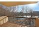 Balcony view of serene lake surrounded by trees on a sunny day at 1800 Clairmont Lk # A326, Decatur, GA 30033