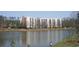 Apartment complex with balconies overlooking a serene lake at 1800 Clairmont Lk # A326, Decatur, GA 30033