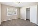 Well-lit bedroom featuring large closet and neutral walls at 1113 Grace Sw St, Mableton, GA 30126