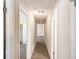 Hallway with carpet and access to rooms at 1113 Grace Sw St, Mableton, GA 30126