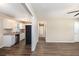 Modern kitchen featuring stainless appliances, stone countertops, and ample cabinet space at 1113 Grace Sw St, Mableton, GA 30126