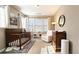 Cozy bedroom with natural light and hardwood floors at 3699 Ashford Creek Ne Hl, Atlanta, GA 30319