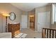 Cozy Bedroom space featuring carpeted floors and access to the Primary bathroom at 3699 Ashford Creek Ne Hl, Atlanta, GA 30319