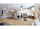 Modern kitchen featuring granite countertops, stainless steel appliances, and pendant lighting at 3699 Ashford Creek Ne Hl, Atlanta, GA 30319