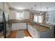 Bright kitchen featuring stainless steel appliances, granite countertops, and a breakfast bar at 3699 Ashford Creek Ne Hl, Atlanta, GA 30319