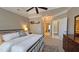 Spacious main bedroom with a ceiling fan and en suite bathroom access at 3699 Ashford Creek Ne Hl, Atlanta, GA 30319