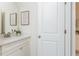 Bright bathroom with white vanity and marble countertop at 3910 Cameron Ct, Cumming, GA 30040