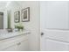 Bright bathroom with white vanity and marble countertop at 3910 Cameron Ct, Cumming, GA 30040