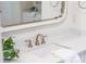 Close-up of vanity, sink, and faucet in bathroom featuring white marble countertop at 3910 Cameron Ct, Cumming, GA 30040