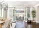 Dining space with French doors that open onto a relaxing outdoor seating area at 3910 Cameron Ct, Cumming, GA 30040