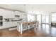 Spacious kitchen with an island, pendant lighting, and ample counter space, perfect for cooking and entertaining guests at 3910 Cameron Ct, Cumming, GA 30040