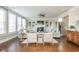 Inviting living room with fireplace, built-ins, hardwood floors, and natural light at 3910 Cameron Ct, Cumming, GA 30040