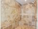 Beautiful walk-in shower with decorative tile design and built-in seat at 2400 Weber Heights Way, Buford, GA 30519