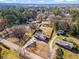 Expansive aerial view showcasing the property's generous lot size, mature trees, and desirable neighborhood at 4493 Old Hiram Lithia Spgs Rd, Powder Springs, GA 30127