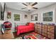 A bedroom with a ceiling fan, a bed, and a window at 4493 Old Hiram Lithia Spgs Rd, Powder Springs, GA 30127