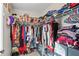 Walk-in closet with lots of hanging space and drawers at 4493 Old Hiram Lithia Spgs Rd, Powder Springs, GA 30127