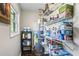 A storage room featuring a water heater and shelves at 4493 Old Hiram Lithia Spgs Rd, Powder Springs, GA 30127
