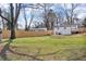 Vast backyard featuring a sturdy wooden fence, providing privacy and a secure outdoor space at 926 Natham Dr, Atlanta, GA 30315