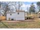 Back of house with a newly built deck, offering a peaceful outdoor space and privacy fence at 926 Natham Dr, Atlanta, GA 30315