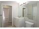 Bathroom with a modern vanity and large mirror at 1074 Peachtree Sw Walk # B 216, Atlanta, GA 30309