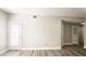 Spacious living room with a door to a balcony at 1074 Peachtree Sw Walk # B 216, Atlanta, GA 30309