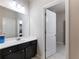 Bathroom with neutral wall color, dark cabinets and granite countertops at 134 Jacobs Ln, Loganville, GA 30052