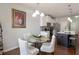 Kitchen with island, dining nook, granite counters, and stainless steel appliances at 134 Jacobs Ln, Loganville, GA 30052