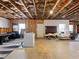 An unfinished basement featuring exposed ceiling and many furnishings at 134 Jacobs Ln, Loganville, GA 30052