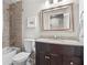 Bathroom with shower/tub, framed mirror, granite counters, and good lighting at 2793 Frontier Trl, Atlanta, GA 30341