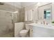 Modern bathroom with a glass-enclosed shower and white vanity at 320 Morganshire Pl, Atlanta, GA 30350