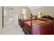 Bedroom featuring two beds, neutral walls, carpet, and access to bathroom at 320 Morganshire Pl, Atlanta, GA 30350