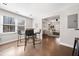 Basement bar area featuring windows for natural light, and seating for entertaining at 327 Horseshoe Bend Bnd, Woodstock, GA 30189