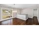 Elegant living room featuring hardwood floors, natural light, and a stylish modern chandelier at 959 Frontier Sw Trl, Marietta, GA 30060