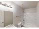 Bright bathroom with a tub and shower combo, a vanity and neutral walls at 2357 Wellborn Hills Pl, Lithonia, GA 30058