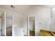 Bathroom featuring natural light, neutral walls, granite vanity and access to another room at 2357 Wellborn Hills Pl, Lithonia, GA 30058
