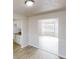 Open dining area with views of the living room and kitchen at 2357 Wellborn Hills Pl, Lithonia, GA 30058