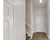 Inviting foyer with hardwood floors and a staircase at 2357 Wellborn Hills Pl, Lithonia, GA 30058