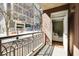 Balcony with decorative wrought iron railings and partial city views at 1101 Juniper St # 61, Atlanta, GA 30309