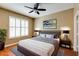 Stylishly staged bedroom featuring a plush bed, modern lighting, and a decorative piece of art at 1101 Juniper St # 61, Atlanta, GA 30309