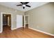Bedroom featuring hardwood floors, neutral wall paint and ceiling fan at 1101 Juniper St # 61, Atlanta, GA 30309