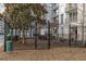 Community dog run provides a safe and enclosed space for pets to exercise and socialize at 1101 Juniper St # 61, Atlanta, GA 30309
