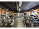 Well-equipped gym featuring modern cardio machines and ample natural light at 1101 Juniper St # 61, Atlanta, GA 30309