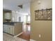 A kitchen with neutral cabinets and hardware that seamlessly flows into the living area at 1101 Juniper St # 61, Atlanta, GA 30309