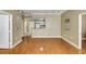 Hardwood floors lead to kitchen in this open floor plan living space at 1101 Juniper St # 61, Atlanta, GA 30309